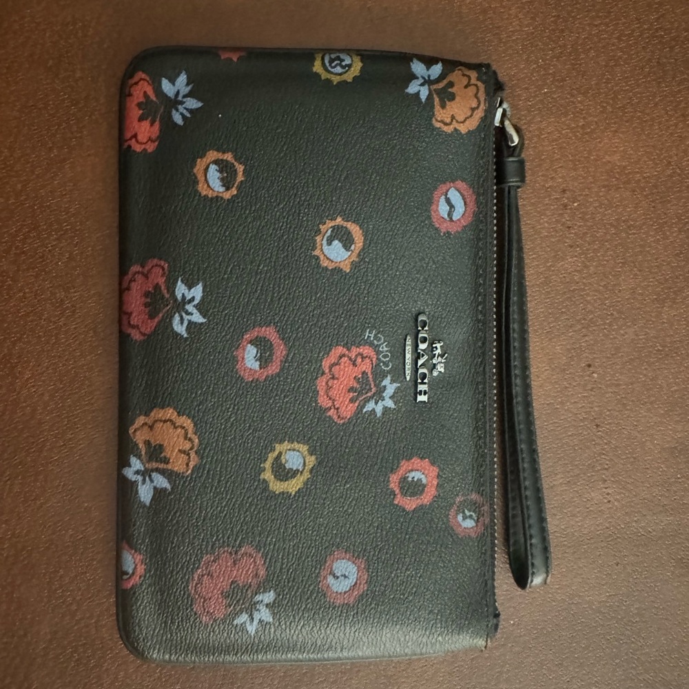 Coach wristlet baby with flower pattern